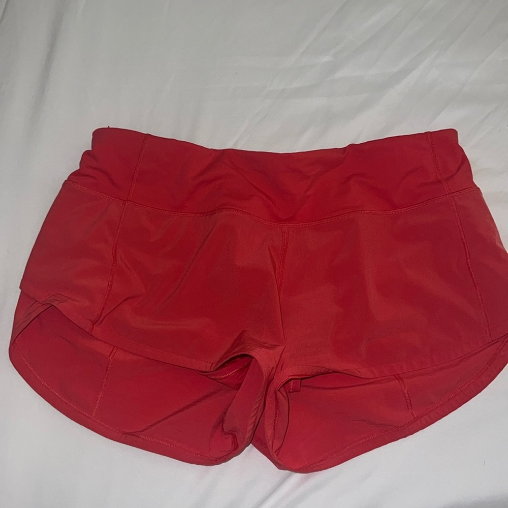 Lululemon size 4 speed up lined short 2.5” Color: Redish/pink